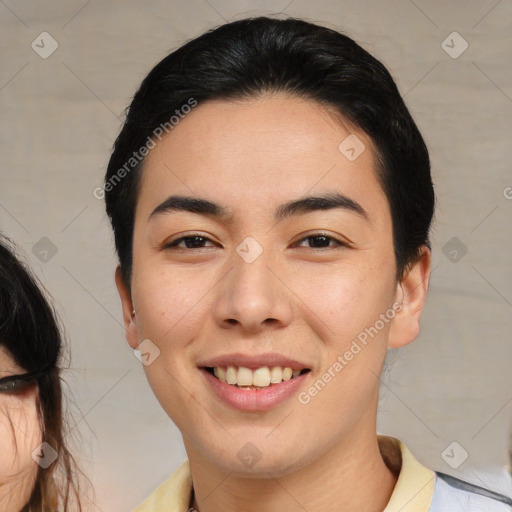 Joyful asian young-adult female with medium  black hair and brown eyes