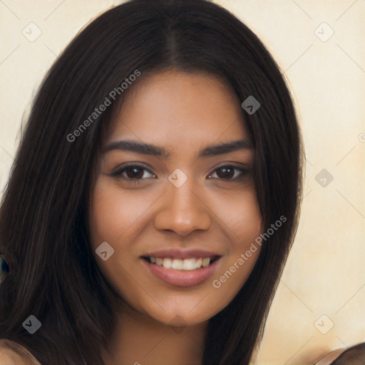 Joyful latino young-adult female with long  brown hair and brown eyes