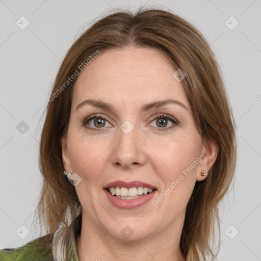 Joyful white young-adult female with medium  brown hair and green eyes