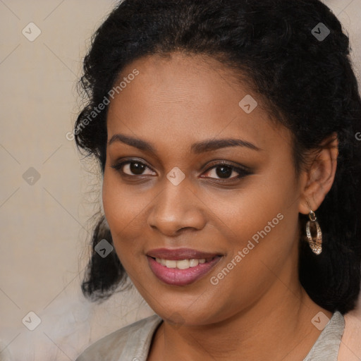 Joyful black young-adult female with long  brown hair and brown eyes