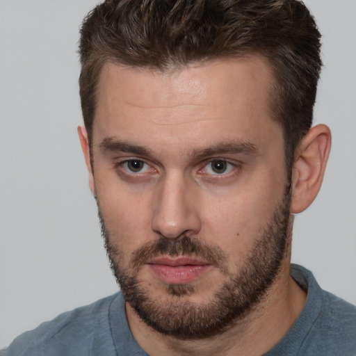 Neutral white young-adult male with short  brown hair and brown eyes