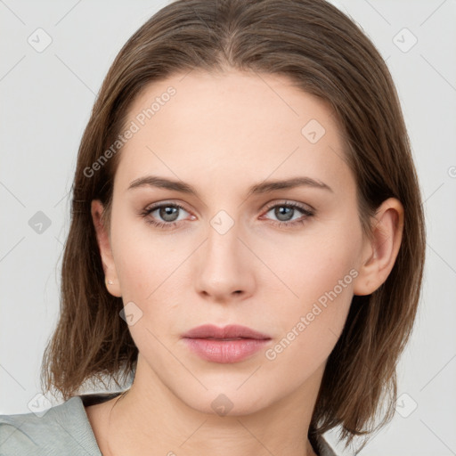 Neutral white young-adult female with medium  brown hair and grey eyes