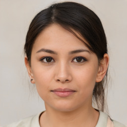 Neutral asian young-adult female with medium  brown hair and brown eyes