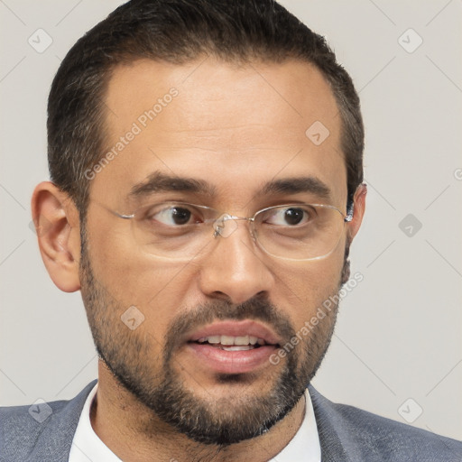 Joyful white adult male with short  brown hair and brown eyes