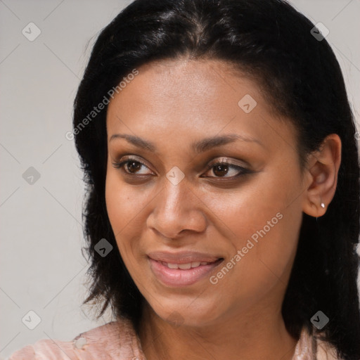 Joyful black young-adult female with medium  brown hair and brown eyes