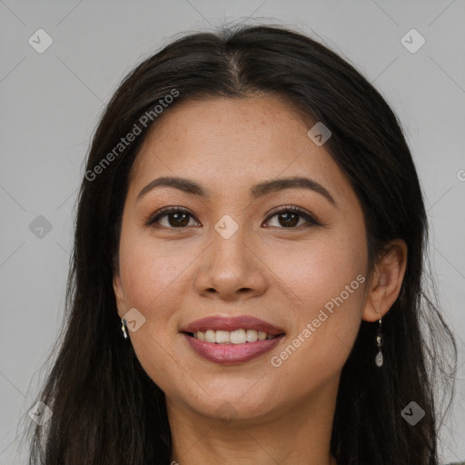 Joyful asian young-adult female with long  brown hair and brown eyes