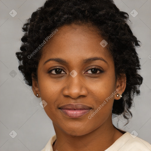 Joyful black young-adult female with medium  black hair and brown eyes