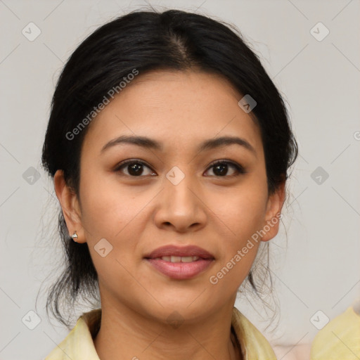 Joyful asian young-adult female with medium  brown hair and brown eyes