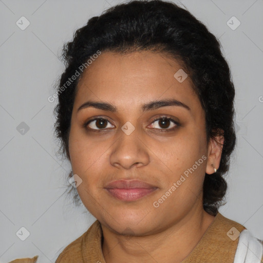 Joyful black young-adult female with medium  brown hair and brown eyes