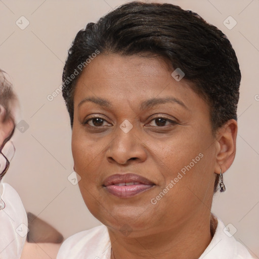 Joyful white adult female with short  brown hair and brown eyes