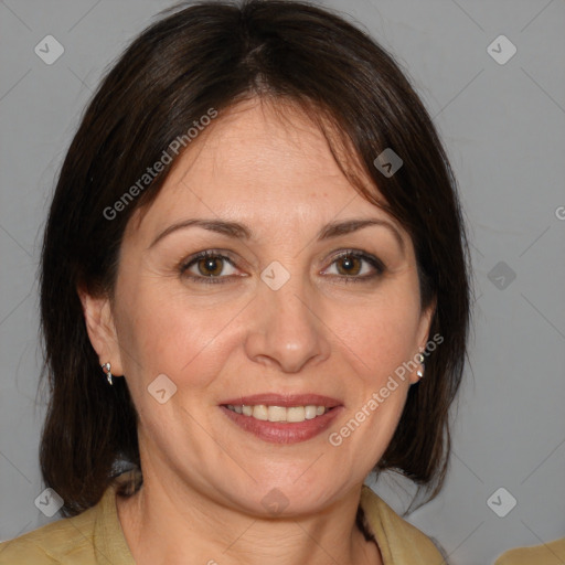 Joyful white adult female with medium  brown hair and brown eyes