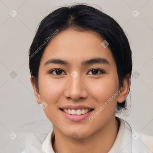 Joyful asian young-adult female with medium  black hair and brown eyes