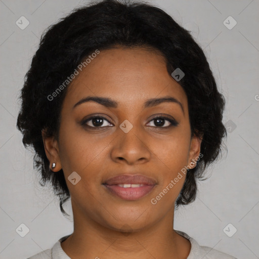 Joyful black young-adult female with medium  black hair and brown eyes