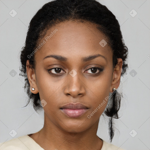 Neutral black young-adult female with medium  black hair and brown eyes