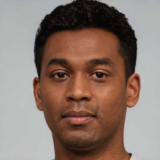 Neutral black young-adult male with short  black hair and brown eyes