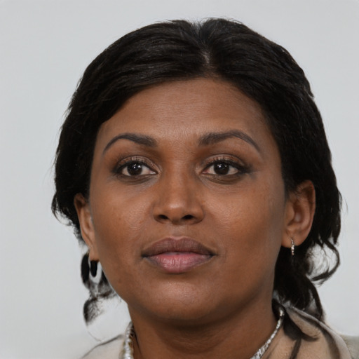 Neutral black young-adult female with medium  black hair and brown eyes