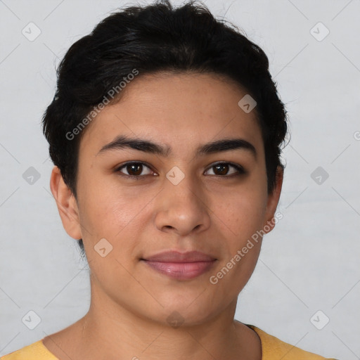 Joyful latino young-adult female with short  brown hair and brown eyes