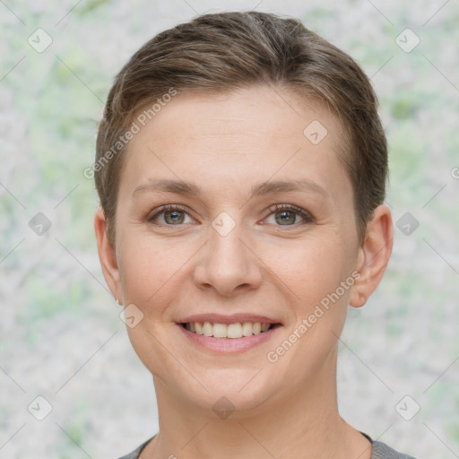 Joyful white young-adult female with short  brown hair and grey eyes