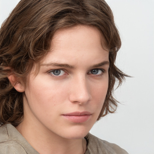 Neutral white young-adult female with medium  brown hair and blue eyes