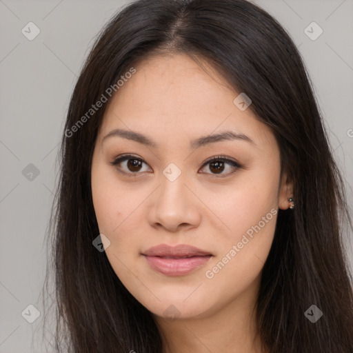 Joyful asian young-adult female with long  brown hair and brown eyes