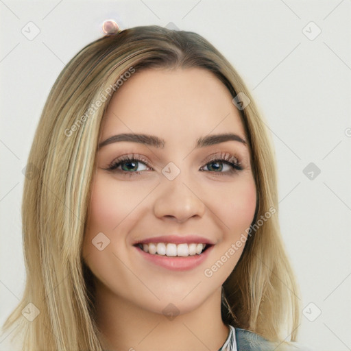 Joyful white young-adult female with long  brown hair and blue eyes