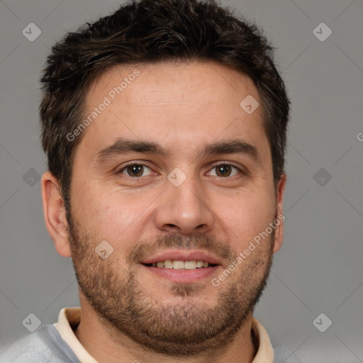 Joyful white adult male with short  brown hair and brown eyes