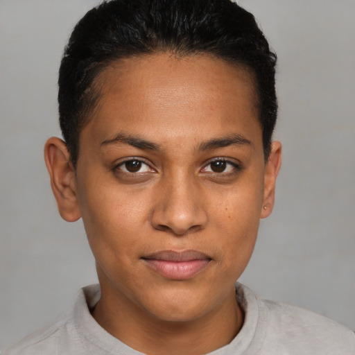Joyful latino young-adult female with short  brown hair and brown eyes