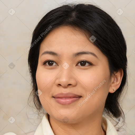 Joyful asian young-adult female with medium  brown hair and brown eyes