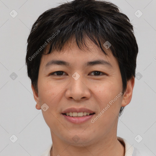 Joyful asian young-adult female with short  brown hair and brown eyes