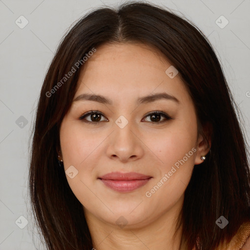 Joyful asian young-adult female with long  brown hair and brown eyes