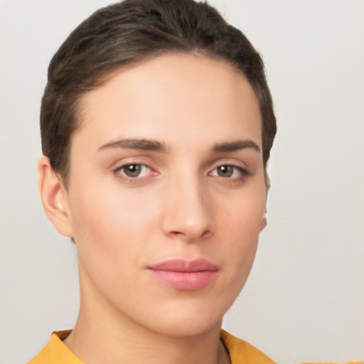 Neutral white young-adult female with short  brown hair and brown eyes