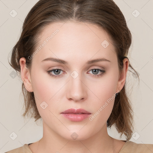 Neutral white young-adult female with medium  brown hair and grey eyes