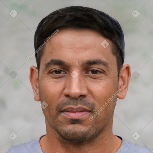 Neutral white young-adult male with short  black hair and brown eyes