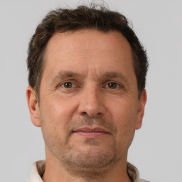 Neutral white adult male with short  brown hair and brown eyes