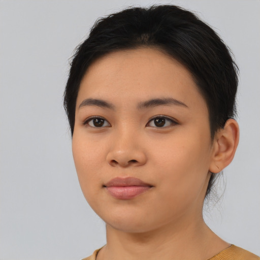 Neutral asian young-adult female with medium  black hair and brown eyes