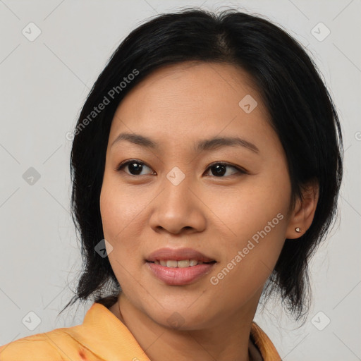 Joyful latino young-adult female with medium  black hair and brown eyes