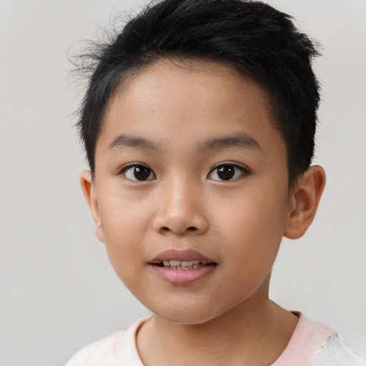 Joyful latino child female with short  brown hair and brown eyes