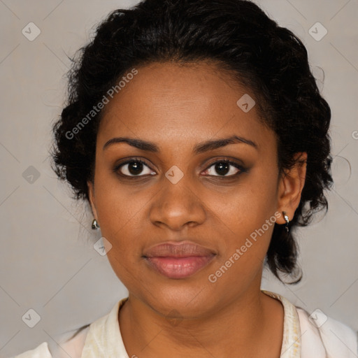 Joyful black young-adult female with medium  brown hair and brown eyes