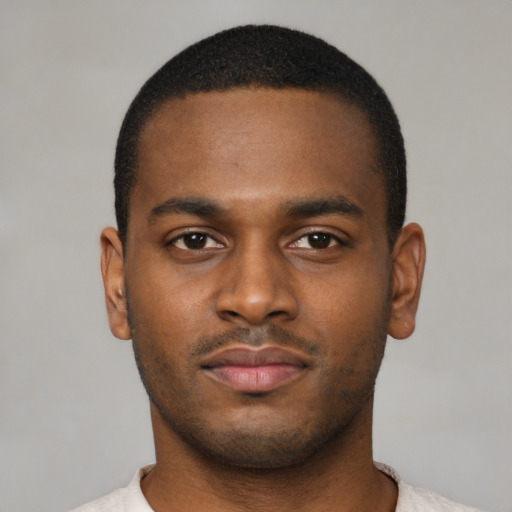 Neutral black young-adult male with short  brown hair and brown eyes