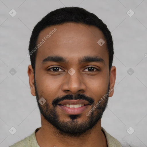 Joyful black young-adult male with short  black hair and brown eyes