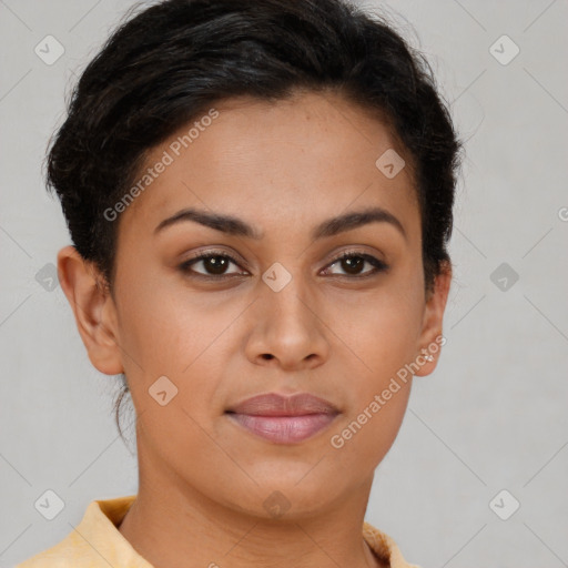 Joyful latino young-adult female with short  brown hair and brown eyes