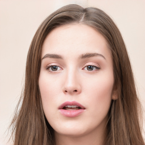 Neutral white young-adult female with long  brown hair and grey eyes