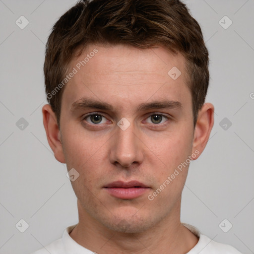 Neutral white young-adult male with short  brown hair and grey eyes