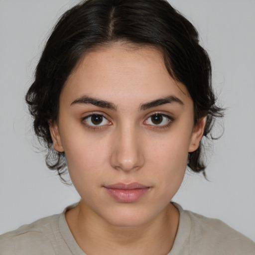 Neutral white young-adult female with medium  brown hair and brown eyes