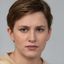 Neutral white young-adult female with short  brown hair and grey eyes