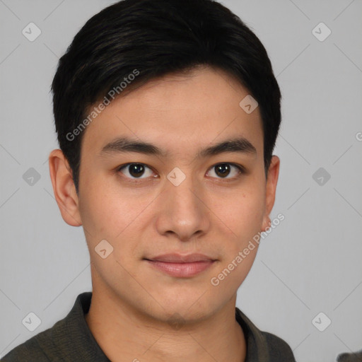 Joyful asian young-adult male with short  brown hair and brown eyes