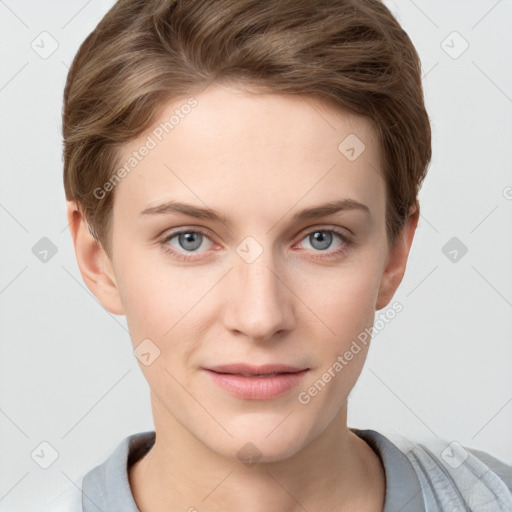 Joyful white young-adult female with short  brown hair and grey eyes