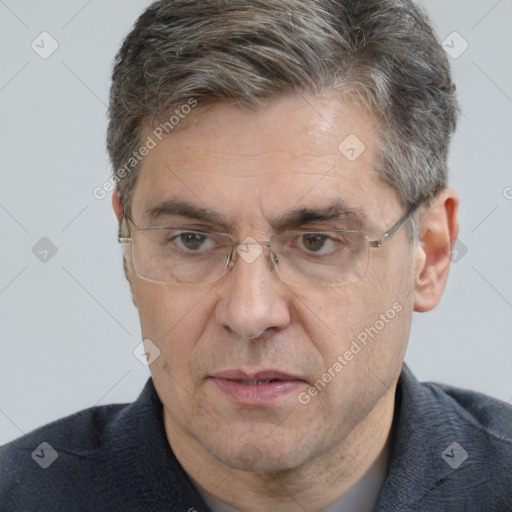 Neutral white middle-aged male with short  brown hair and brown eyes