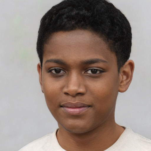Joyful black child female with short  black hair and brown eyes