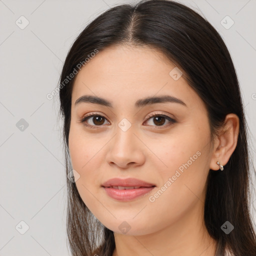 Joyful white young-adult female with long  brown hair and brown eyes